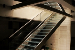 Modern straight glass staircase with laminated tempered glass