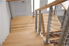 Indoor mono stringer staircase with cable railing and wood handrail