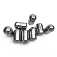 Tungsten carbide buttons and tips for rock drilling tools