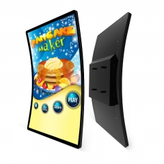 Curved touch screen monitor for slot machines