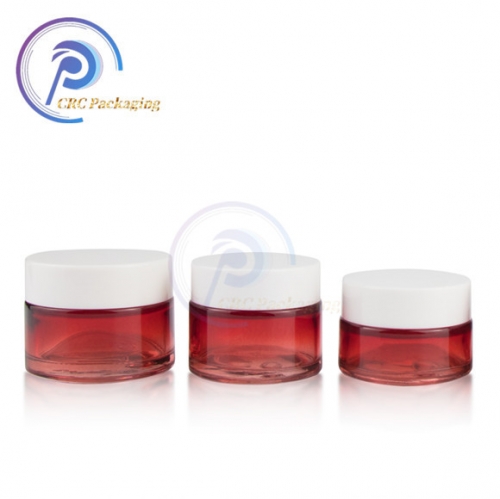 wholesale luxury small round personal eye skin care use cream pink and red cosmetic glass bottle jar with white cover