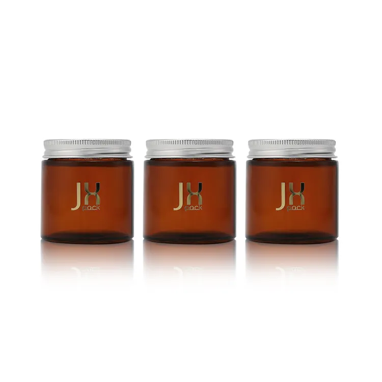 Luxury clear amber brown glass jar cookie tea packaging food grade jar with aluminum lids containers