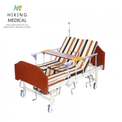 Multi-Function Manual Rotating Hospital Bed With Wooden Bedhead