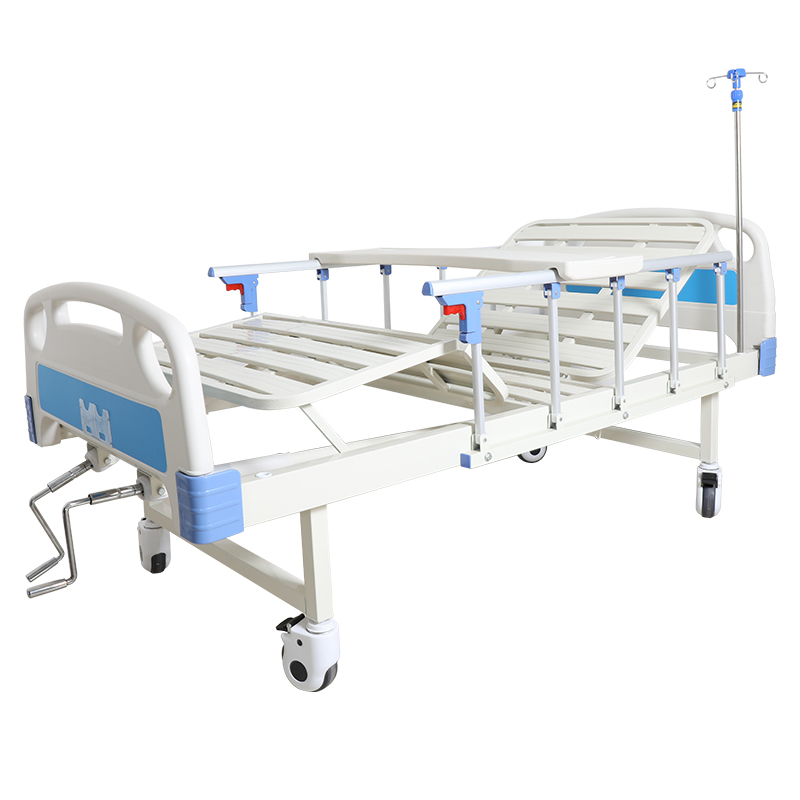 two cranks hospital bed with commode