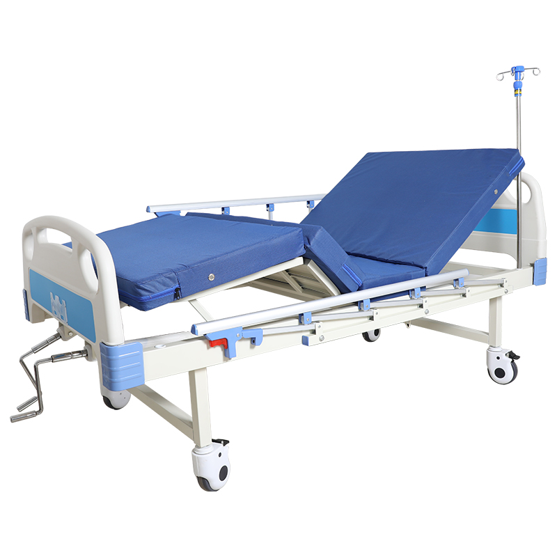 two cranks hospital bed with commode