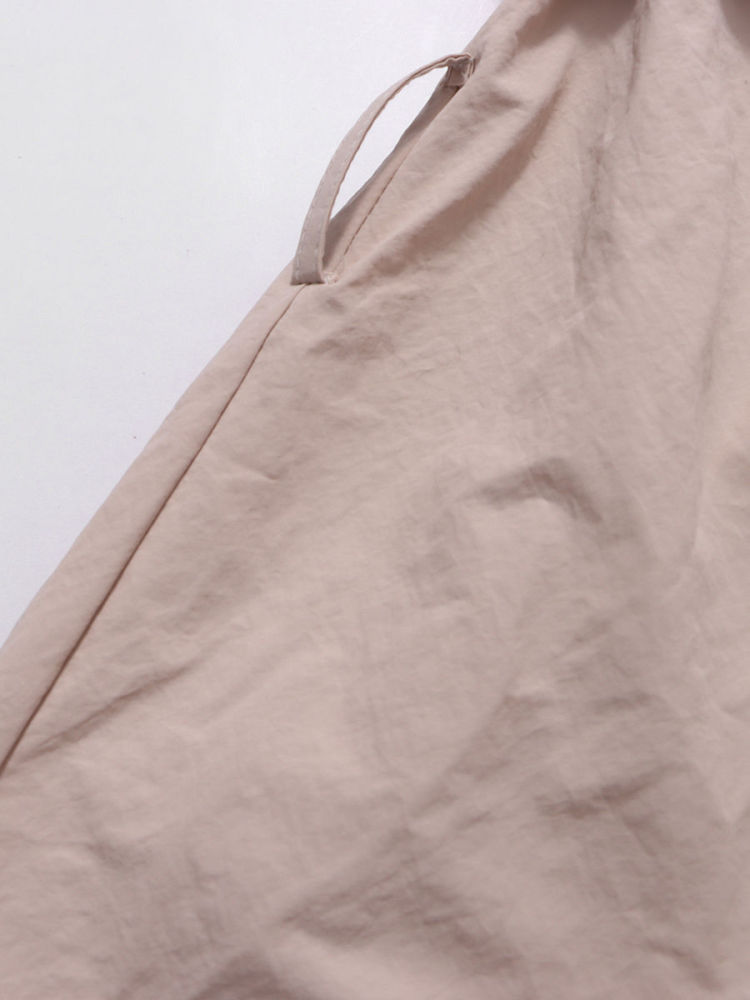 TWOTWINSTYLE Solid Spliced Lace Up Pleated Windbreaker