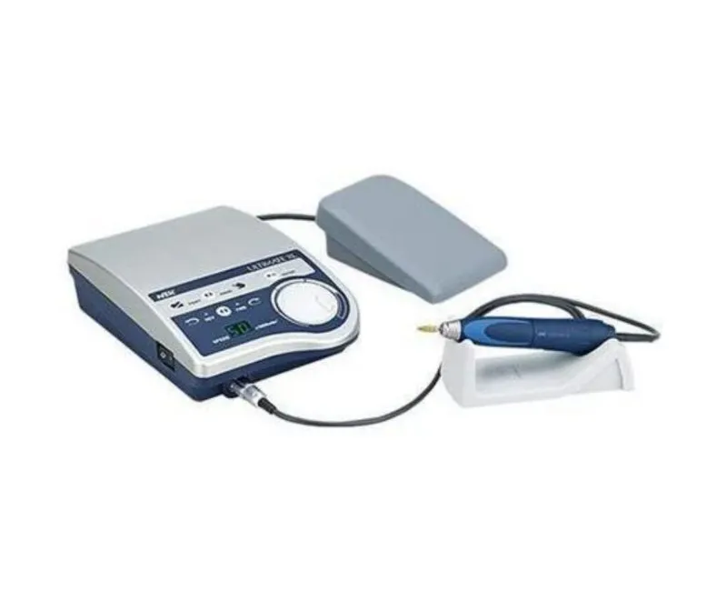 NSK Ultimate XL micromotor system featuring a control box, foot pedal, and a blue handpiece resting on a white stand.