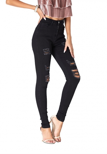 Slim-fit denim pants with ripped holes