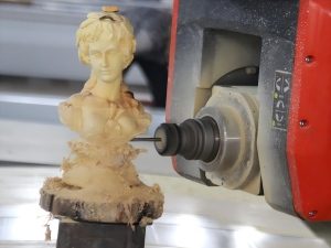 wood sculpture made by 5 axis cnc center 