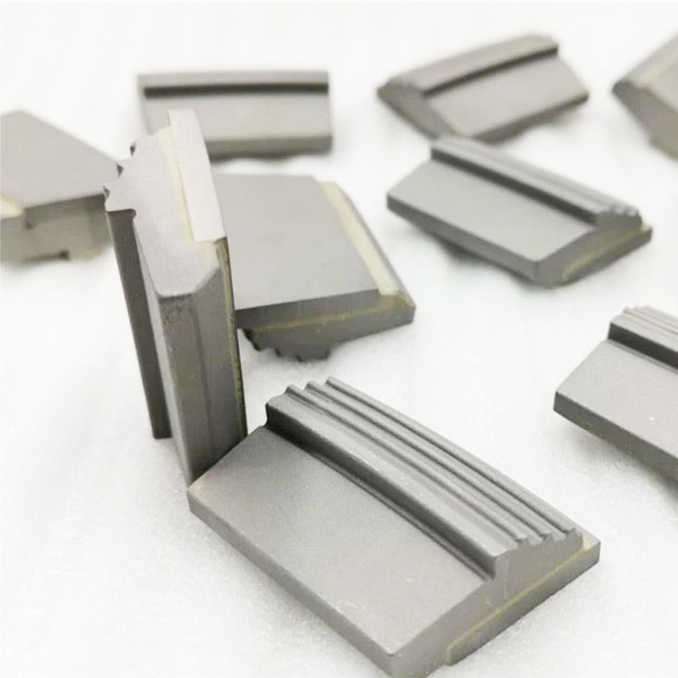 Tungsten carbide assembly tiles 
