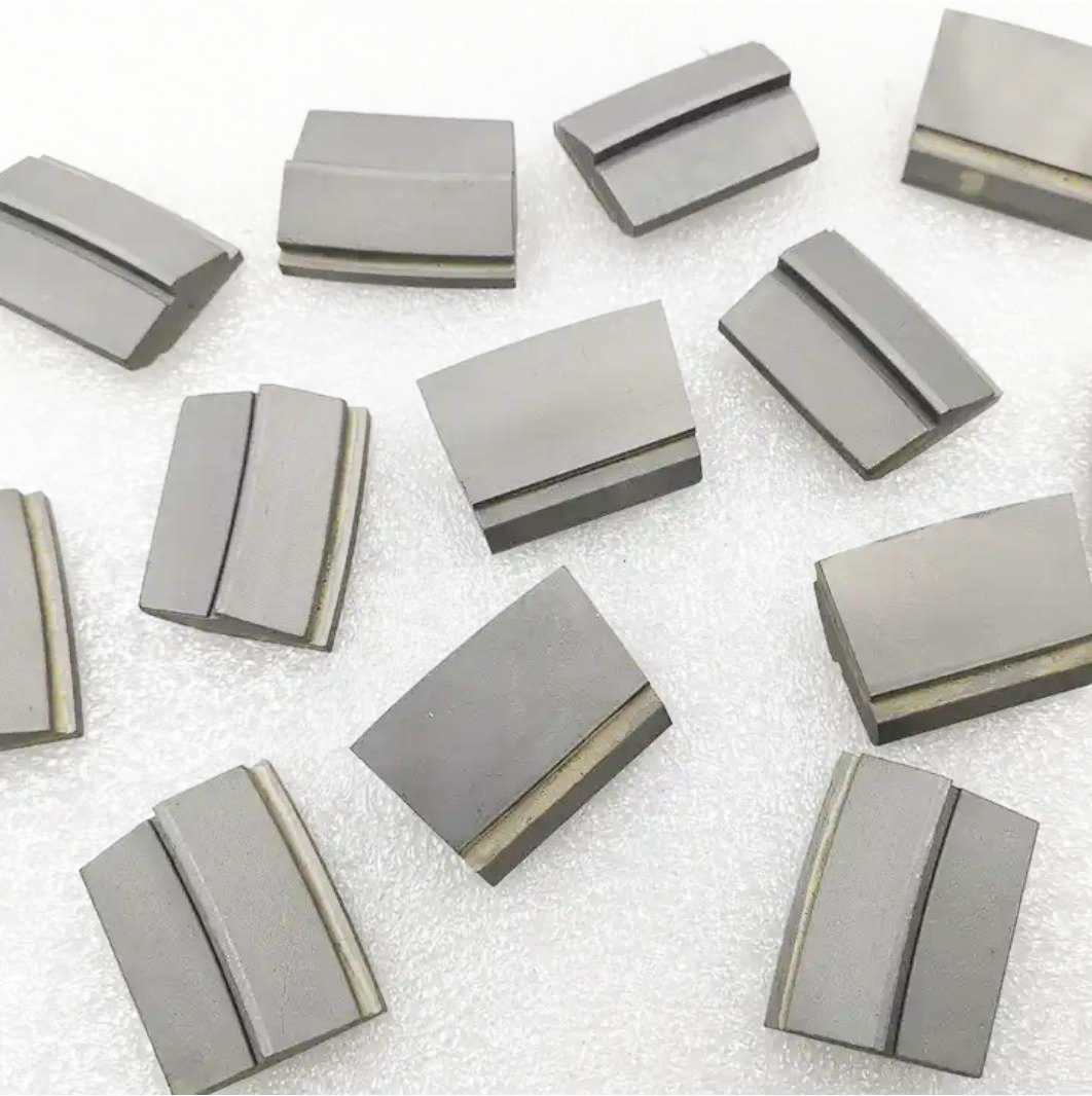 Tungsten carbide assembly tiles 