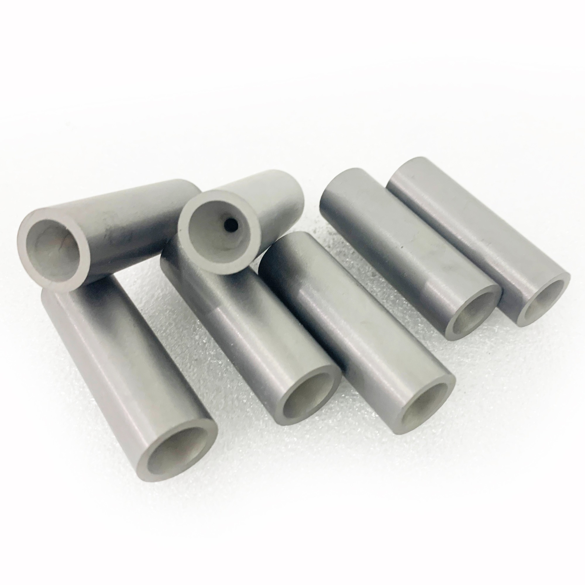 Tungsten wire guiding bushings