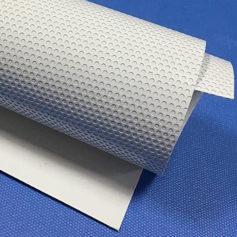 Polymeric perforated film