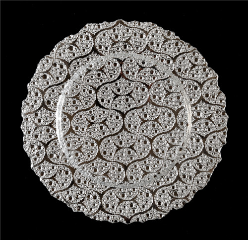 silver colored flower charger plate
