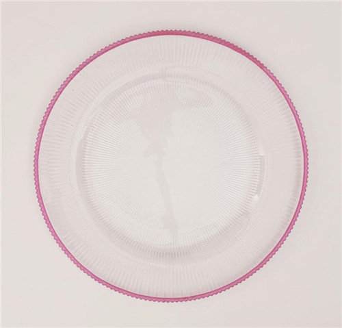 pink rimmed glass charger plate