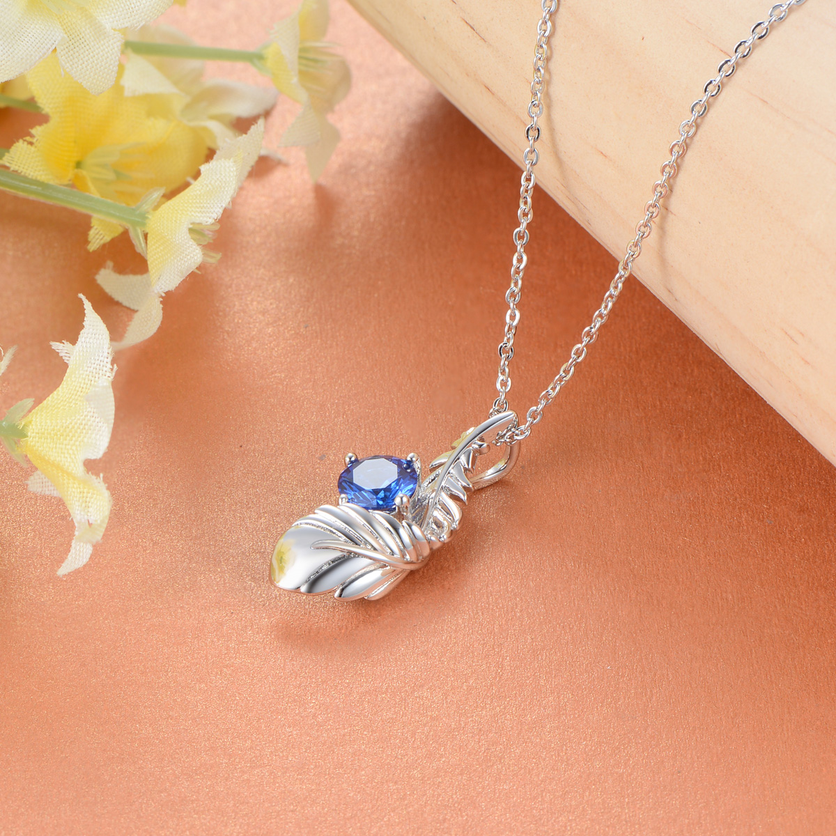 sapphire zircon feather necklace