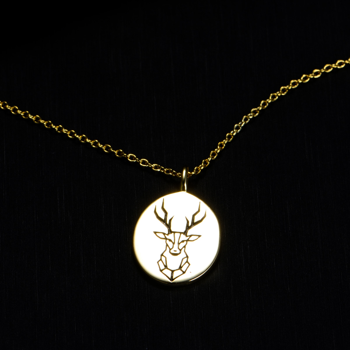 carved deer head pandant necklace