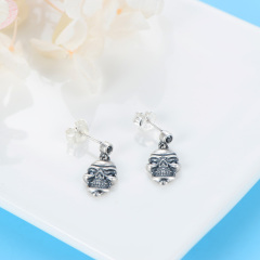 Black skull head studs earrings