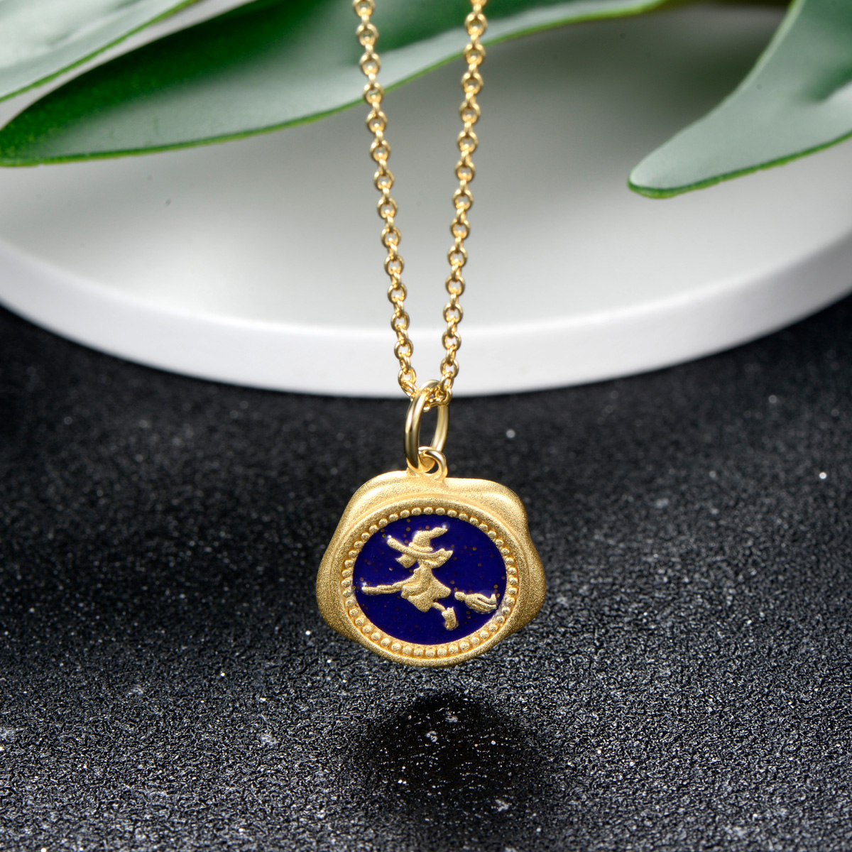 The wizard on the broom pendant necklace