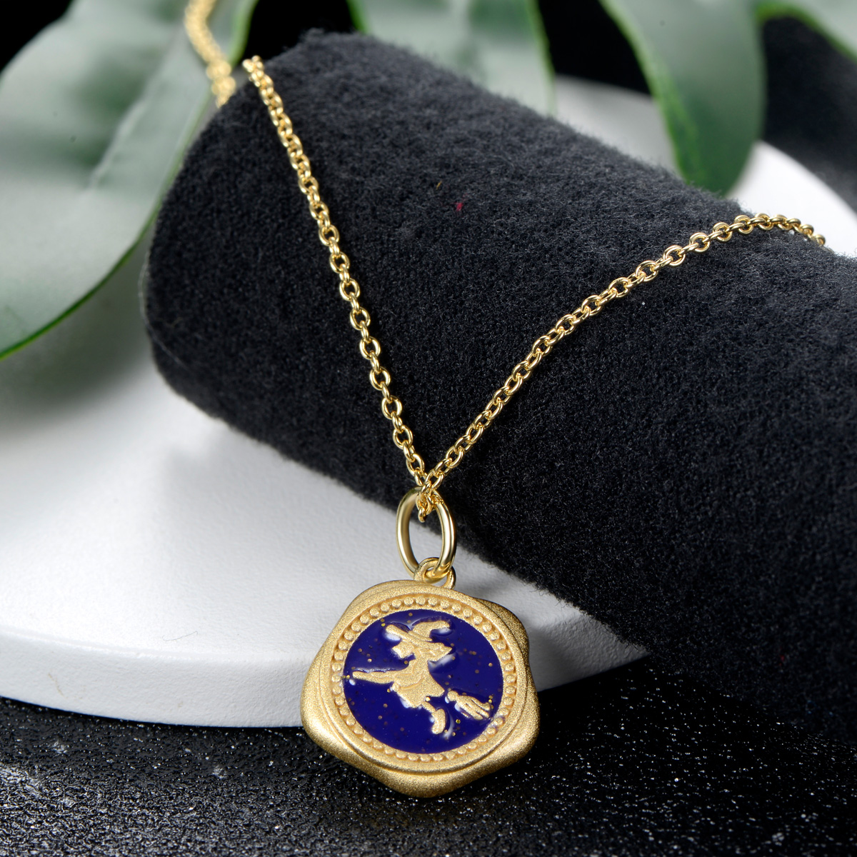 The wizard on the broom pendant necklace