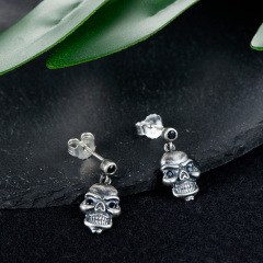 Black skull head studs earrings