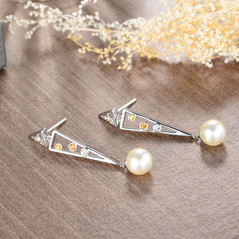 Pearl geometry stud earrings