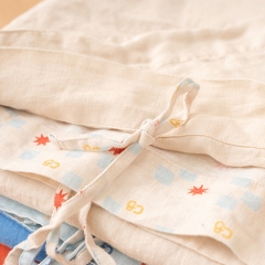 Light pink linen duvet cover set with printed logo