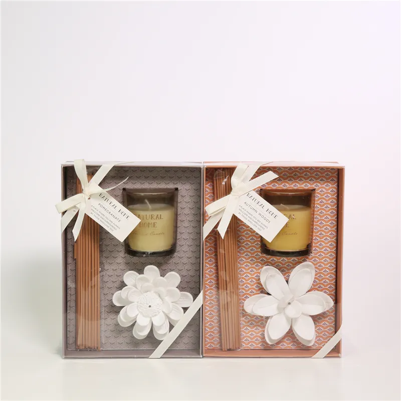 DESCRIPTION: 15.5X6.5X21.5CMH AROMA GIFT SET 1)D6.2X7.5CMH DECORATED SCENTED GLASS CANDLE 2)D10.5CM GESSCO FLOWER INCENSE SEAT COLOR/SCENT 1)PURPLE/POMEGRANATE； 2)ORANGE/WOODS