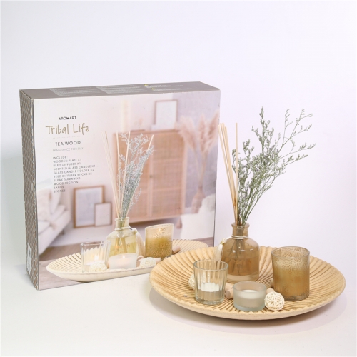 DESCRIPTION:
  33X33X9CMH AROMA GIFT SET  1. D31X4CMH WOODEN PLATE  2. D6.2X7.5CMH DECORATED SCENTED GLASS CANDLE  3. D6.7X9.5CMH 100ML DECORATED GLASS DIFFUSER+6PCS RATTAN  4. D5X3.2CMH DECORATED CUP HOLDER+1PC SCENTED TEALIGHT  5. D5.5X6.5 GLASS HOLDER+