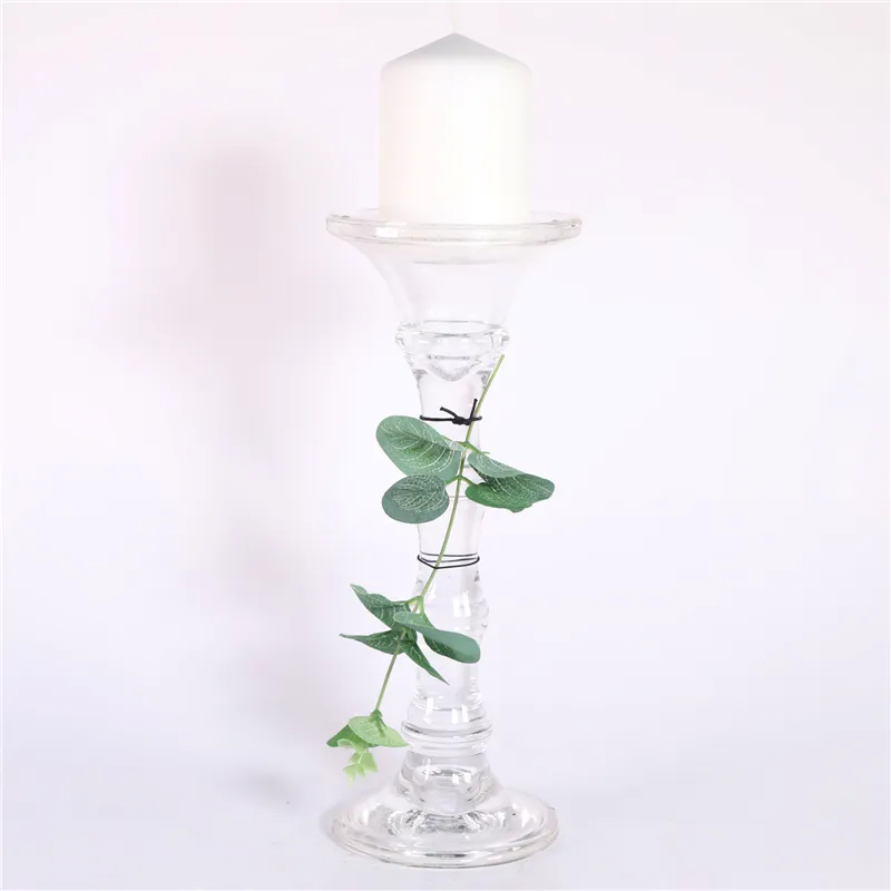 DESCRIPTION: D12X29.5CMH CLEAR GLASS CANDLE HOLDER W/D7X10CMH PRESSING CANDLE W/DECO. WAX COLOR WHITE DECO. LEAF