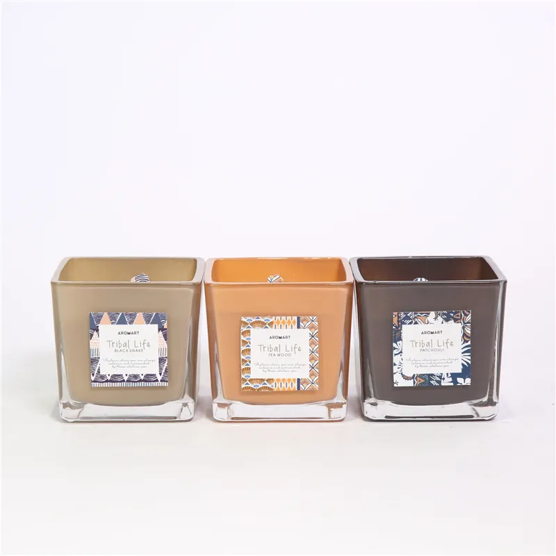 DESCRIPTION: D8X8X8CMH DECORATED SCENTED SQUARE GLASS CANDLE COLOR/SCENT:1)COOL GREY/PATCHOULI；2)ORANGE BROWN/TEA WOOD；3)WARM GREY/BLACK SNAKE