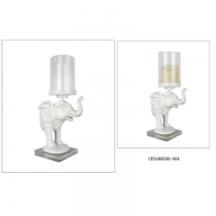 Resin elephant with glass candle holder