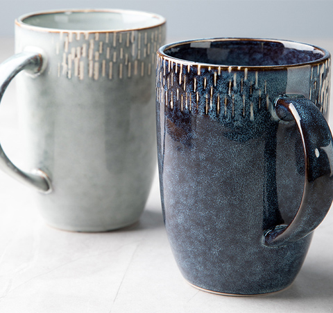 “ These intriguing stoneware mugs feature hand drawn patterns that are screen printed across each mug, I like!”