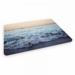 Mouse pad setting sun is the sea