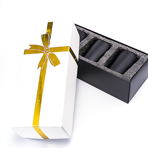 Scented candles with black glass jar