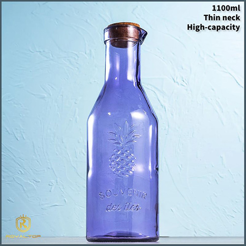 Glass juice bottle