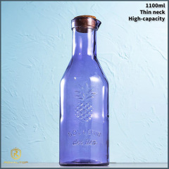 Glass juice bottle