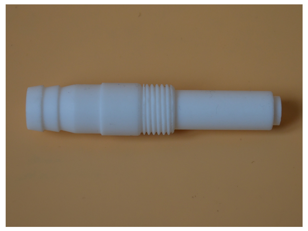Telflone insert sleeve for powder injector