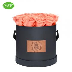 Round flower box with ribbon handle
