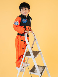 child with steel ladder