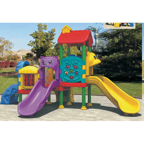 Outdoor playground with tube slides