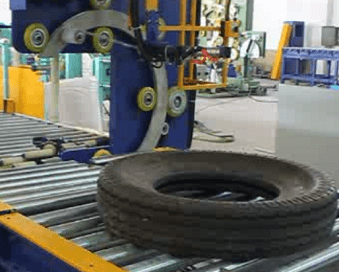 tire packing line with conveyor