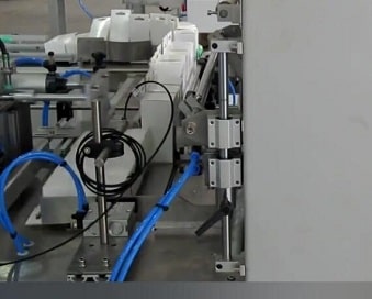 heat shrink packaging machine aligning boxes