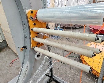 Film holder of the horizontal pallet orbital stretch wrapper