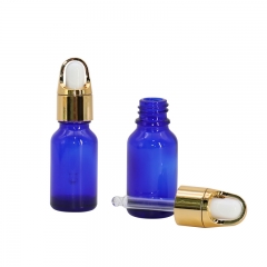 Color Clear Glass Dropping Bottles for sale , Golden Cap Dropper Bottle for Hair Essential Oil