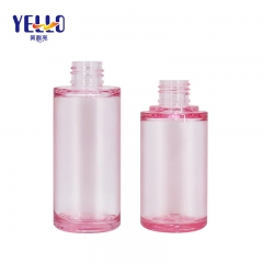 Botellas de loción PETG de plástico rosa claro de 50 ml y 60 ml con bomba plateada