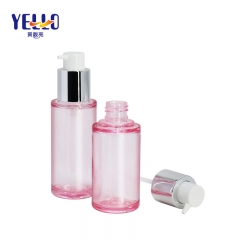 Botellas de loción PETG de plástico rosa claro de 50 ml y 60 ml con bomba plateada