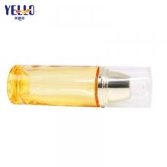 Botellas de loción de vidrio amarillo claro con bomba y tarro de crema para el cuidado de la piel