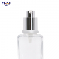 Botella de vidrio con bomba de loción de suero transparente y tarro de crema de vidrio de lujo de 50 ml
