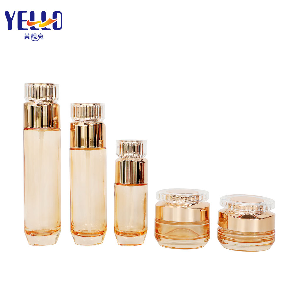 luxury glass cosmetic bottles and jar with gold cap